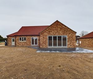 Main elevation- click for photo gallery